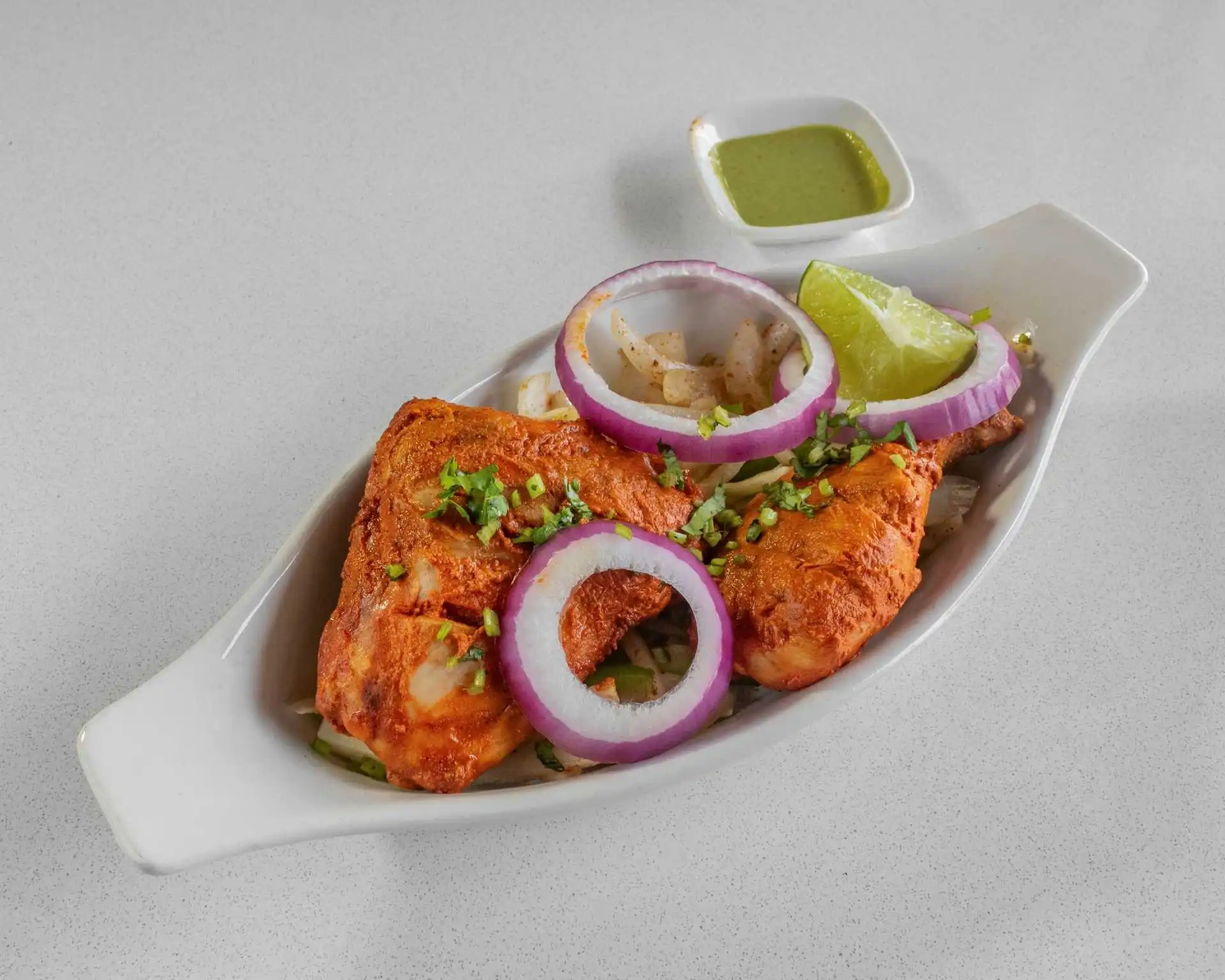 Tandoori specialties grilled in clay oven at Kissan Restaurant Tamarack Edmonton